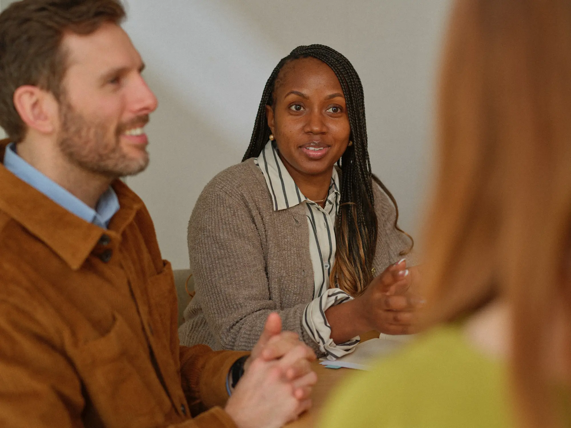 Colleagues discussing work together