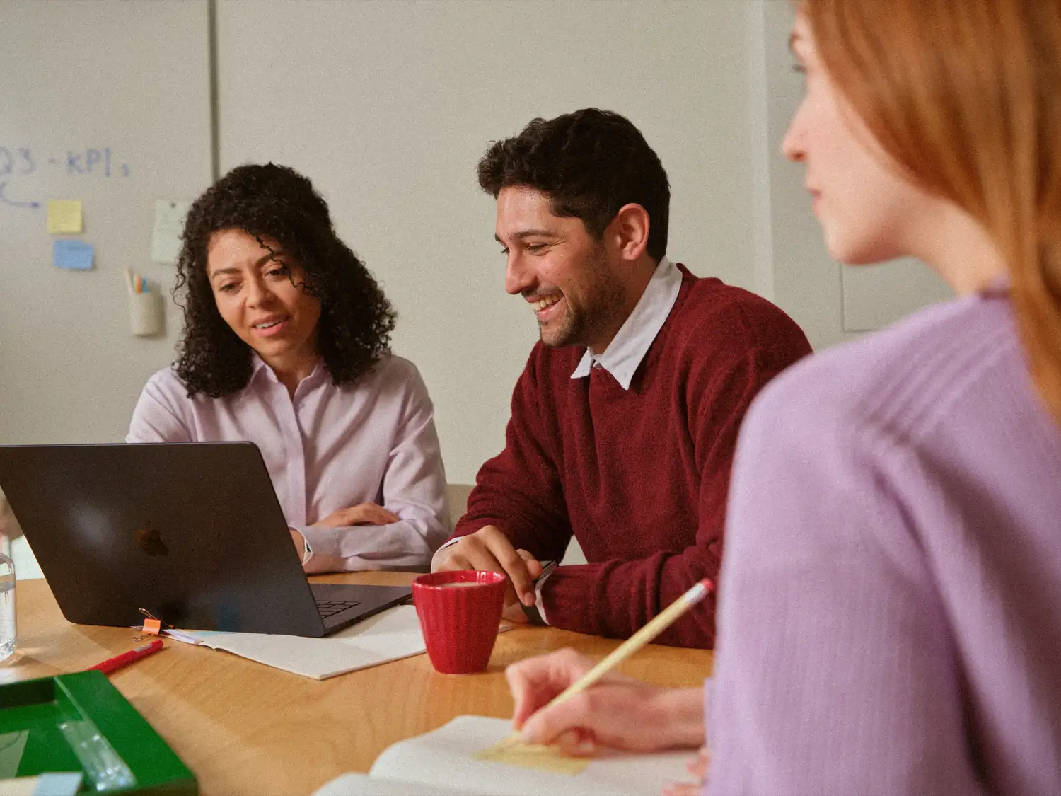 Team meeting — professionals collaborating at work